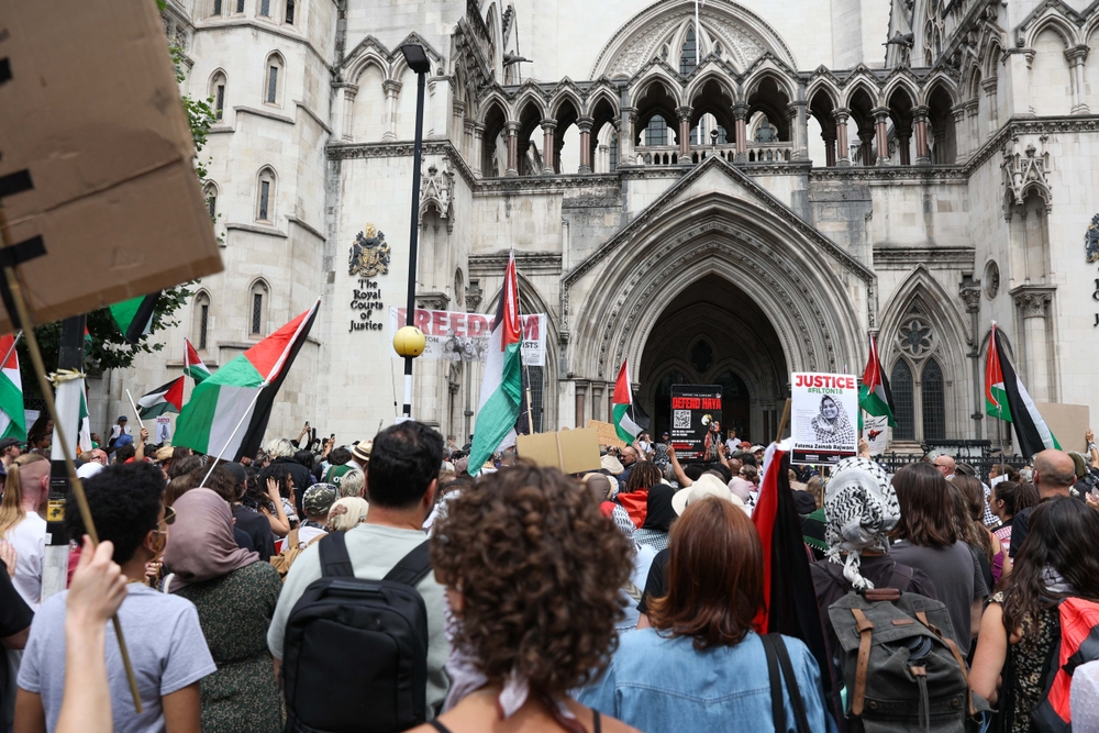 Protesters gather in support of Palestine Action outside of the High Court
